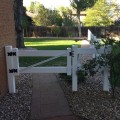 Durables 2-Rail Vinyl Ranch Rail Horse Fence with 5' Posts (Gray) - Priced Per Foot (White Shown As Example) - Single Gate Installation Shown